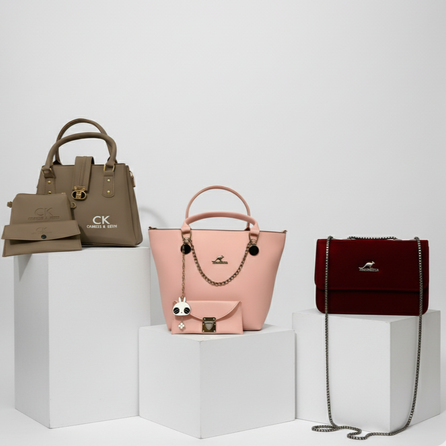 Three handbags on white cubes with a neutral background